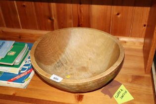 A wooden dugout bowl