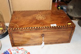 A 19th Century mahogany and inlaid writing box, ke