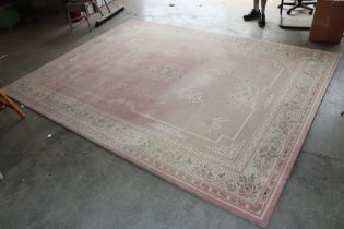 An approx. 11'1" x 8'3" patterned rug AF