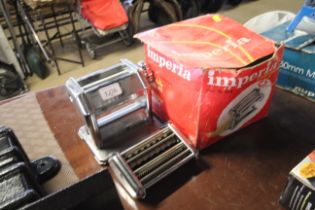 An Imperia rotary pasta maker with original box an