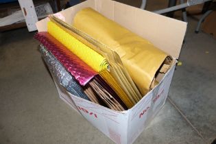 A box containing Jiffy and bubble envelopes