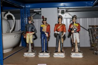 Four model soldiers