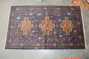 An approx. 4'7" x 2" Valuchi rug