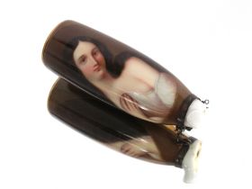 A 19th Century porcelain pipe bowl, decorated with a scantily clad young maiden, 10.5cm AF, complete