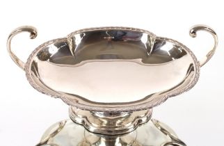 An Edwardian silver fruit comport by Asprey & Co. having shaped foliate border flanked by scroll