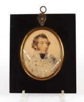 A mid-19th Century watercolour portrait, of a military gentleman in black papier mâché frame, 14.5cm