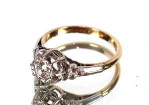 An 18ct and platinum ring, set with a single diamond of approx. ¼ carat
