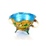 A Chinese brightly enamelled footed bowl, applied with two finely carved white jade side handles