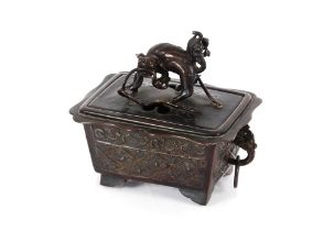 A 17th / 18th Century Chinese bronze censer and cover of rectangular form, decorated in the