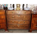 An antique oak chest of four long drawers, raised on bun feet, 85cm wide AF