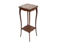 A French walnut marble and gilt metal mounted two tier plant stand, raised on shaped supports,