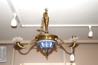 A Wedgwood and brass three light chandelier