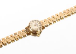 A Candino 9ct gold ladies wrist watch, 11gms total weight