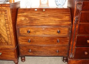 A Victorian mahogany bureau, the fall front opening to reveal and interior arrangement of drawers