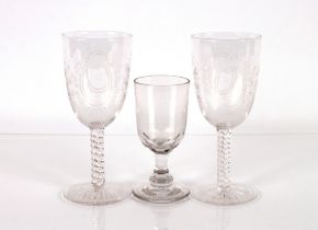 A pair of etched glass goblets on spiral twist stems and a small 19th Century rummer