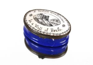 An oval Staffordshire enamel hinged pill box, the lid inscribed "A Found Conscience Is A Wall Of