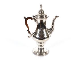 A George III silver baluster shaped coffee pot, probably by Jacob Marsh, the hinged domed lid