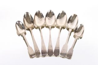 Three George III silver "Old English" pattern table spoons, London 1776; another similar 1812; a