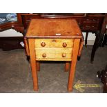 A Victorian walnut drop leaf side table, fitted two short drawers and raised on square section