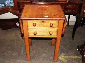 A Victorian walnut drop leaf side table, fitted two short drawers and raised on square section