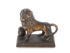 A small bronze model of The Lion Of Waterloo, 9cm long