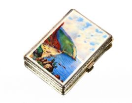 A silver engine turned and enamel cigarette case, decorated with a coastal scene, 8cm x 5.5cm