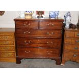 A Georgian mahogany chest of two short and three long drawers, raised on bracket supports, 103cm