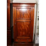 A 19th Century mahogany single door wardrobe, with hanging compartment, single drawer below raised