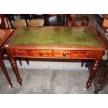 A Victorian mahogany writing table, with green leather inset top and two drawers below, raised on