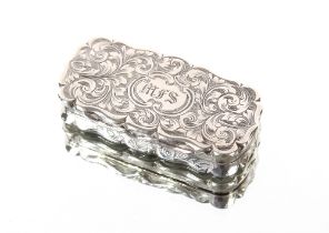 A Victorian silver vinaigrette, maker Edward Smith, circa 1851, the shaped hinged lid with foliate