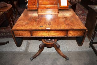 A 19th Century rosewood sofa table, fitted single drawer and opposing dummy drawer, the rounded drop