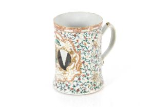 A large 19th Century armorial tankard, AF Restored. 16cm high