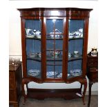An Edwardian inlaid mahogany china display cabinet, the interior fabric lined shelves enclosed by