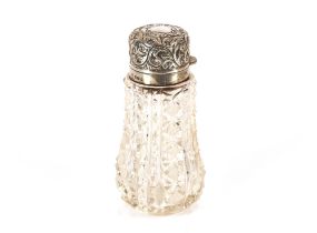 A late Victorian cut glass and silver mounted scent bottle, Chester 1895, 12.5cm high