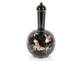 A Victorian bottle vase, with enamelled butterfly and flower decoration, heightened in gilt,