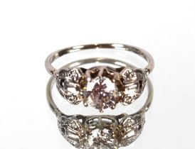 An 14ct gold white gold ring set with a single diamond of approx. ¾ carat