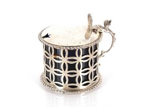 An Edwardian silver drum shaped mustard pot, having pierced body with blue glass liner, Birmingham