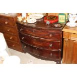 A Victorian mahogany bow front chest fitted three