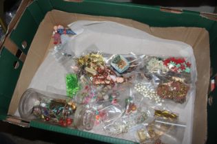 A box of vintage buttons and a box containing bead