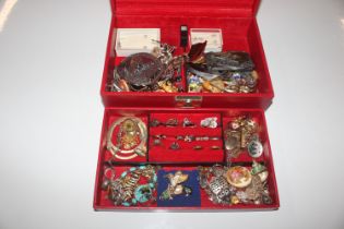 A jewellery box and contents of various costume je