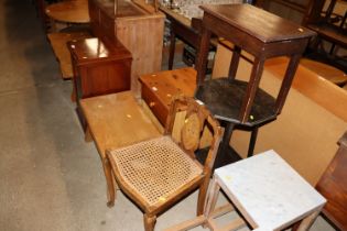 A walnut and cane seated chair; an octagonal toppe