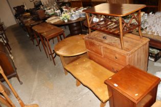 A mid-20th Century circular oak coffee table; a ru