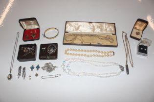 A box of various costume jewellery to include neck