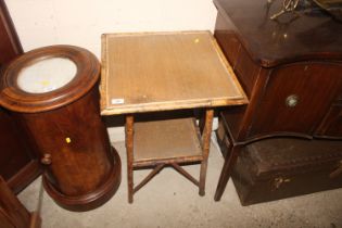 A bamboo two tier occasional table