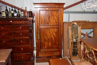 A 19th Century mahogany single door wardrobe with