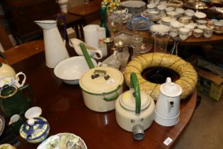 A collection of enamelware including saucepan, jug