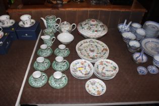 A collection of Chinese dinnerware decorated with