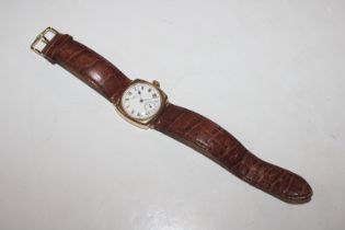 An 18ct gold cased Waltham wrist watch with strap,