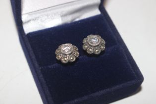 A pair of silver and marcasite ear-rings