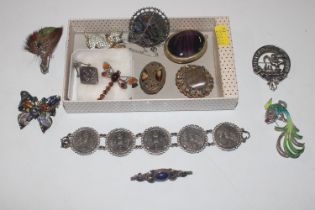 A box containing silver and other brooches, neckla